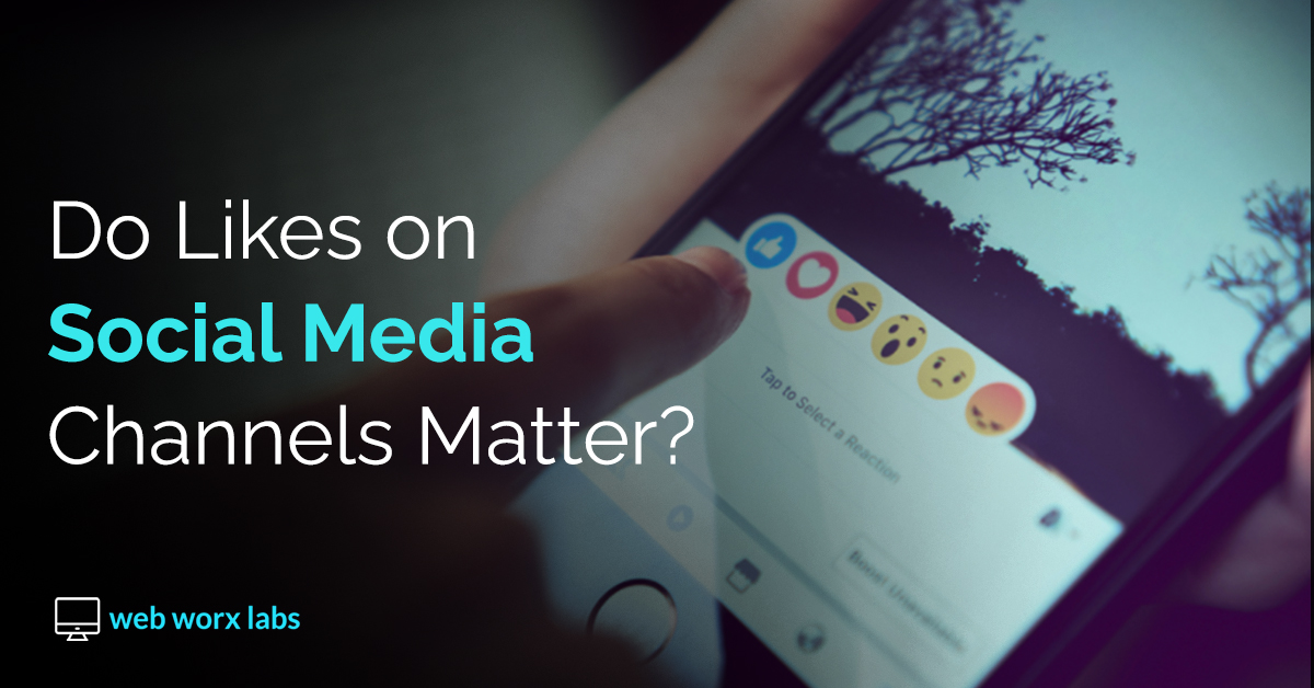 Do Likes On Social Media Even Matter? A Banner Image for Blog showing smartphone with social media app and emojis | Web Worx Labs